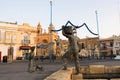 Marsaxlokk, Malta, August 2019. Central square and a monument to fishermen in the early morning.