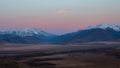 Soft mountains at sunset. Purple sunset over majestic mountains Royalty Free Stock Photo