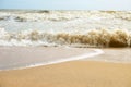 Soft ocean wave on sandy beach