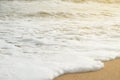 Soft ocean wave on sandy beach