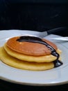 Soft pancake with chocolate syrup Royalty Free Stock Photo