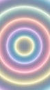 Soft pastel colored concentric circles with a gentle neon glow creating a calming and ethereal abstract background pattern Royalty Free Stock Photo