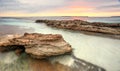 Soft pastel colours of a sunrise at Hyams Beach Australia