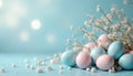 Soft pastel easter eggs with delicate white flowers arranged on a light blue surface. Gentle bokeh lights create a serene spring Royalty Free Stock Photo