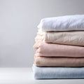 Soft Pastel Folded Fabric Stack Neatly Arranged Isolated on Clean White Background Royalty Free Stock Photo