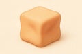 A soft peach cube with rounded edges on a beige background. Royalty Free Stock Photo