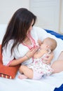 Soft photo young mother feeding breast her baby Royalty Free Stock Photo