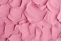 Soft pink cosmetic clay rhassoul, facial mask, cream texture close up, selective focus. Abstract background Royalty Free Stock Photo