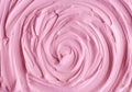 Soft pink cosmetic clay rhassoul, facial mask, face cream, body wrap, hair shampoo texture close up, selective focus. Royalty Free Stock Photo