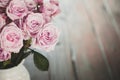 Soft Pink dozen roses in white vase Royalty Free Stock Photo