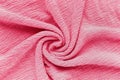 Puckered texture pink fabric. Abstract background in trendy color of the year 2023 Viva Magenta Royalty Free Stock Photo