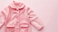 Soft Pink Fleece Children\'s Jacket on Pastel Background - Cozy Kidswear Fashion