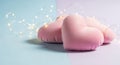 Soft pink heart-shaped pillows arranged gently on a pastel-colored background Royalty Free Stock Photo
