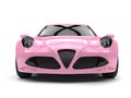 Soft pink modern sports car - front view Royalty Free Stock Photo