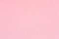 Soft pink paper texture for background usage.