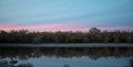 Soft pink sunset sky over Salt River near Mesa Arizona USA Royalty Free Stock Photo