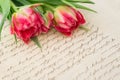 Soft pink tulips with old handwritten love letter Royalty Free Stock Photo