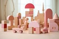 Soft pink wooden construction blocks and shapes for building a children\'s toy for playing. Brain and skill developing. Light