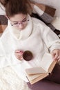 Soft portrait of teenage girl reading book at home Royalty Free Stock Photo