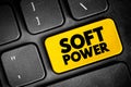 Soft power - ability to attract co-opt rather than coerce, text button on keyboard