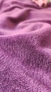 Soft purple blanket on the bed Royalty Free Stock Photo