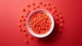 Soft red background with red paste in bowl, natural food dye concept for attractiveness