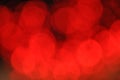 Soft red bokeh in night.moving red glitter lights, defocused light reflections loopable red bokeh background