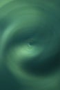 Soft ripple action of sound sonic wave formed in centre, colourful green tone ranged from light to dark, rounded and mixed in a ba