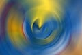 Soft ripple action of sound sonic wave formed in centre, colourful ranged from blue, orange and yellow rounded and mixed in backgr