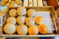 soft rools baked bread in wooden tray