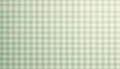 Soft sage green gingham pattern creates calm background. Light pastel checkered design looks gentle, elegant, versatile. Classic Royalty Free Stock Photo