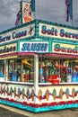 A soft-serve and food booth at a local county fair.