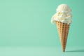 Soft serve ice cream cone on pastel mint colored background. Food cold dessert Royalty Free Stock Photo