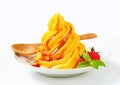Soft serve ice cream with raspberry sauce Royalty Free Stock Photo