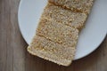 Soft sesame bar Chinese sweetmeat on dish Royalty Free Stock Photo