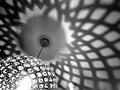 Soft shadow patterns from a modern lamp fitting Royalty Free Stock Photo