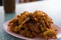 Soft Shell Crab fried with garlic on plate in restaurant