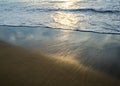 Soft shiny wave of the sea and sand