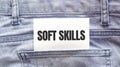SOFT SKILLS words on a white paper stuck out from jeans pocket. Business concept