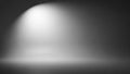 Soft Spotlight Beam Illuminating a Dark Empty Studio Stage with Subtle Reflections Keywords: spotlight, studio Royalty Free Stock Photo