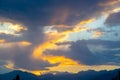 Soft sunset sky. pink and gold clouds. High mountains. Natural background Royalty Free Stock Photo