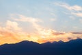 Soft sunset sky. pink and gold clouds. High mountains. Natural background Royalty Free Stock Photo