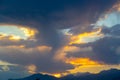 Soft sunset sky. pink and gold clouds. High mountains. Natural background Royalty Free Stock Photo