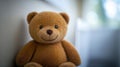 Soft Teddy Bear Sits Beside Empty Crib in Serene Nursery Space With Soft Lighting Royalty Free Stock Photo