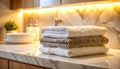 Soft towels arranged on marble surface with diffused lighting Royalty Free Stock Photo
