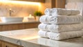 Soft towels arranged on marble surface with diffused lighting Royalty Free Stock Photo