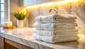Soft towels arranged on marble surface with diffused lighting Royalty Free Stock Photo