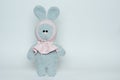 Soft toy knitted bunny. Plush crocheted bunny