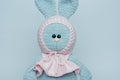 Soft toy knitted bunny. Plush crocheted bunny