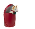 Soft toy light yellow bull in a red gift box.Symbol of the year 2021